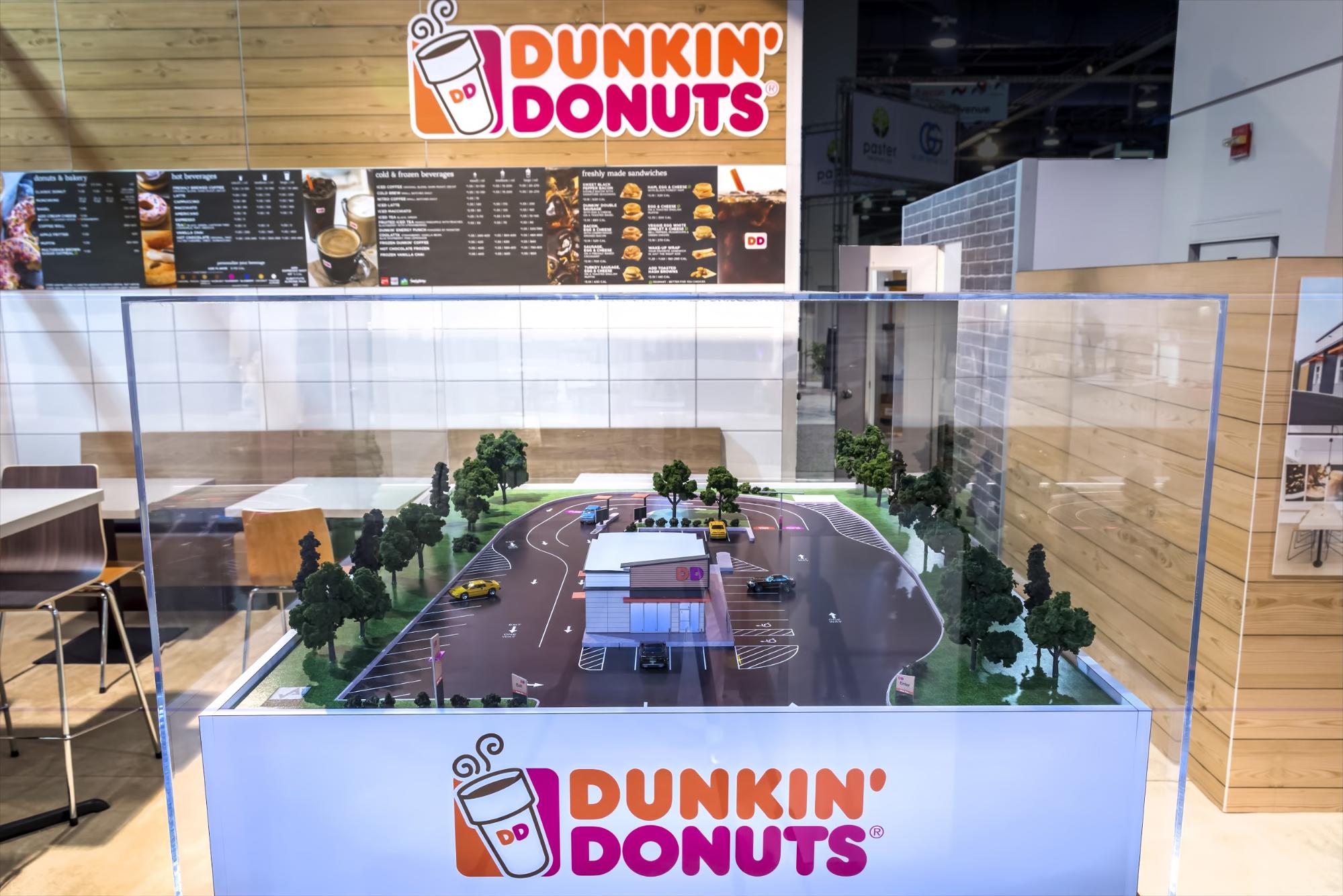 Dunkin' Donuts trade show booth with small-scale model of the store